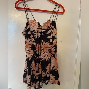 Rumor romper-  black and orange print M.